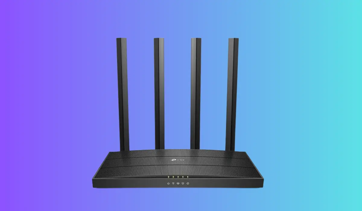 a black router with four antennas